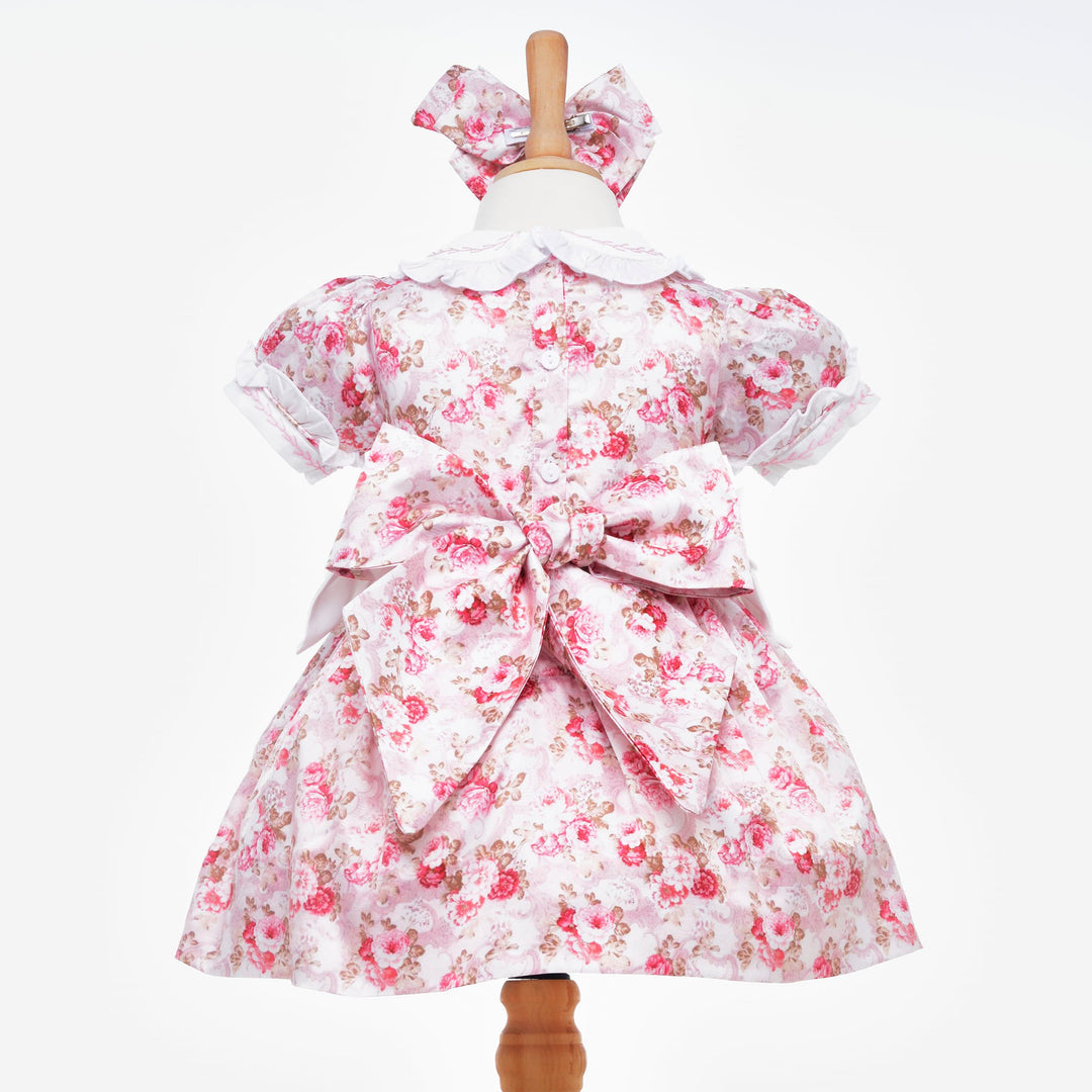 pink smocked baby dress