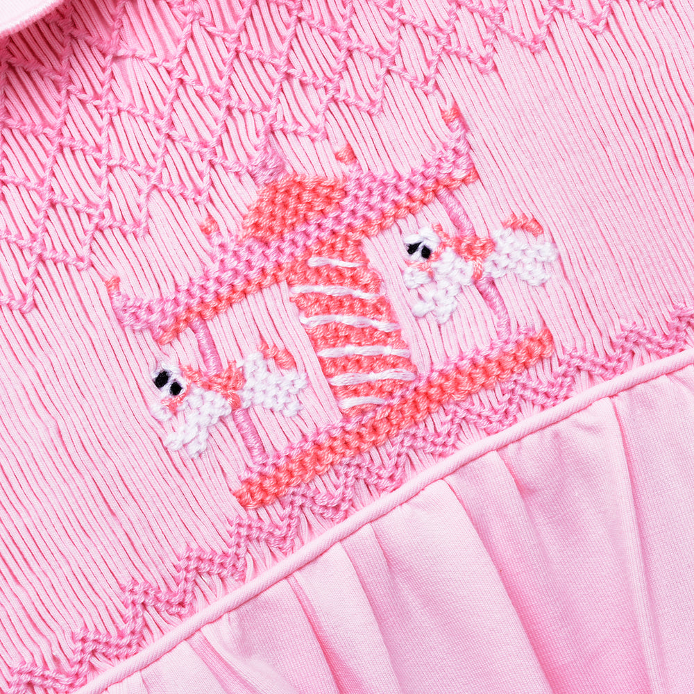smocked baby sleepsuit